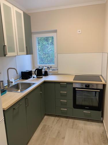 Dapur atau dapur kecil di TópART Apartman C