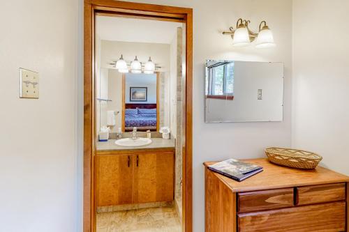 a bathroom with a sink and a mirror at Twilight View II in Durango Mountain Resort