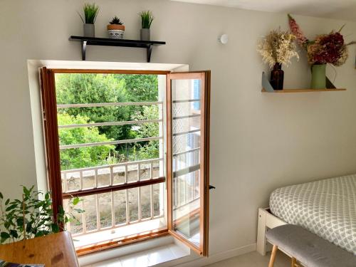 Balkón nebo terasa v ubytování Le Clocher, Studio duplex avec clim