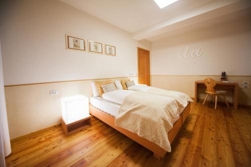 Ein Bett oder Betten in einem Zimmer der Unterkunft Lumen