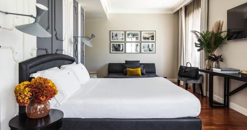 Postel nebo postele na pokoji v ubytování SeePort Hotel