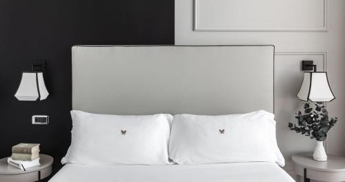 Postel nebo postele na pokoji v ubytování SeePort Hotel