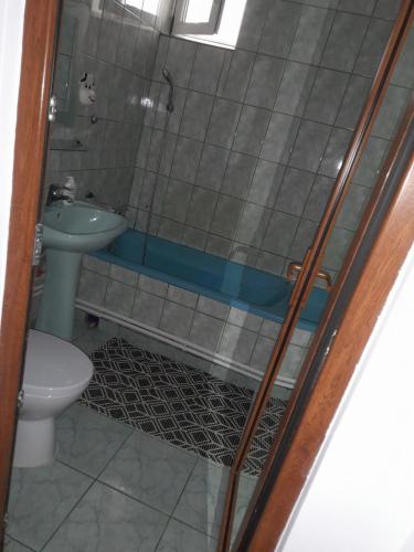 Et badeværelse på Apartament Sira