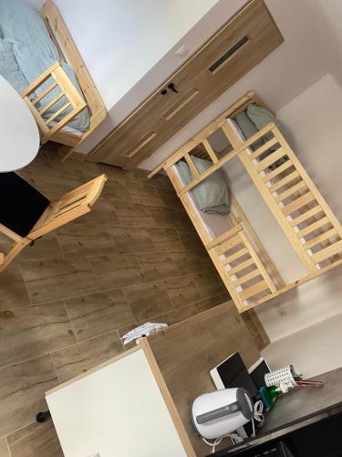 an overhead view of a room with bunk beds at Pokoje blisko morza in Sarbinowo