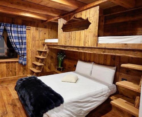 מיטה או מיטות בחדר ב-FORESCH HUS CHAMBRES D'HOTES