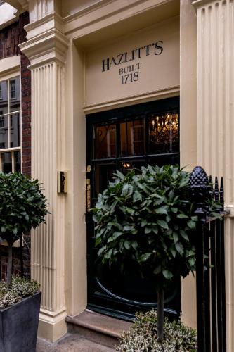 a front door of a harryties clothing store at Hazlitt's in London
