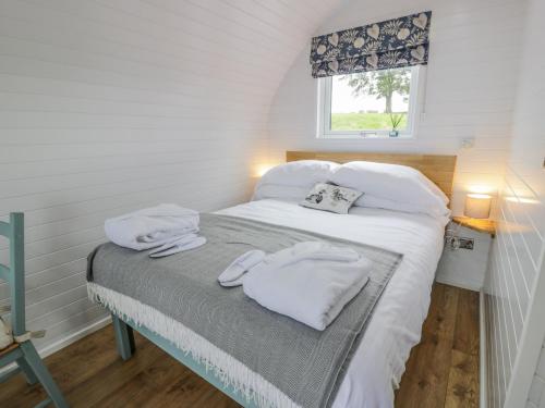 Postel nebo postele na pokoji v ubytování Laird Lodge 2