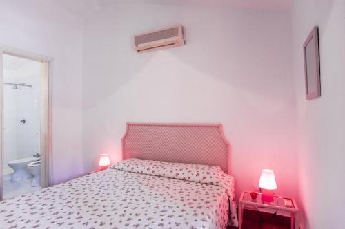 Ένα ή περισσότερα κρεβάτια σε δωμάτιο στο Villetta pineta