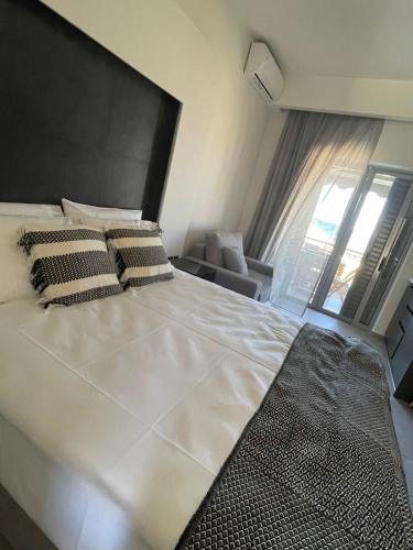 Posteľ alebo postele v izbe v ubytovaní Aellw cozy apartment 1
