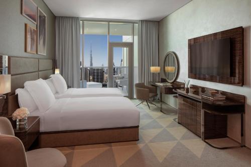 Кровать или кровати в номере Hyde Hotel Dubai