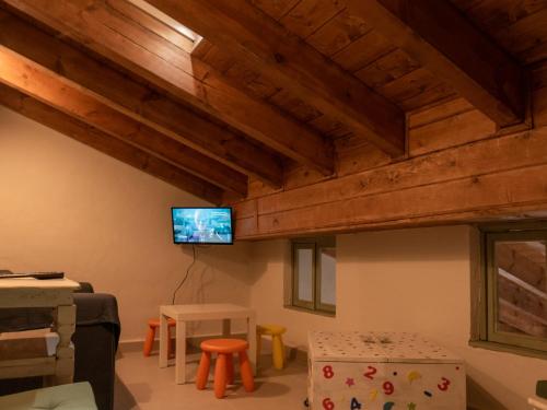 Een TV en/of entertainmentcenter bij Alojamientos Biarritz La Piedra
