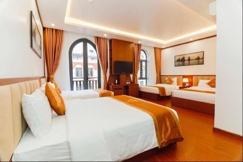 Lova arba lovos apgyvendinimo įstaigoje Quỳnh Anh Hotel Hạ Long