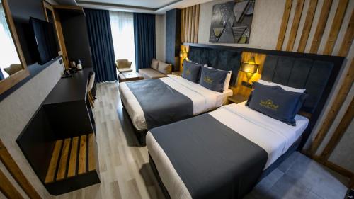 RUA WORLD HOTELにあるベッド