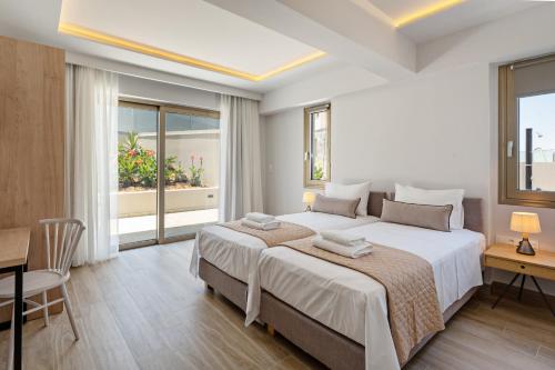 Postel nebo postele na pokoji v ubytování Luxury villa AQUA with 2 heated pools