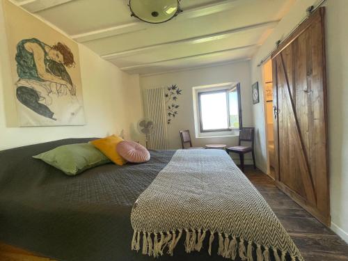 Tempat tidur dalam kamar di Villa Doubledot