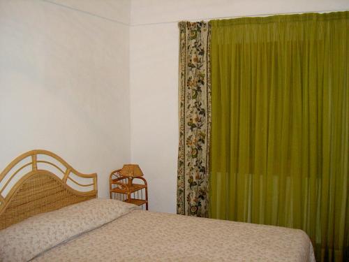 Llit o llits en una habitació de Dammuso Karace