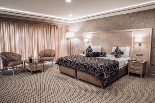Кровать или кровати в номере Tebriz Hotel Nakhchivan