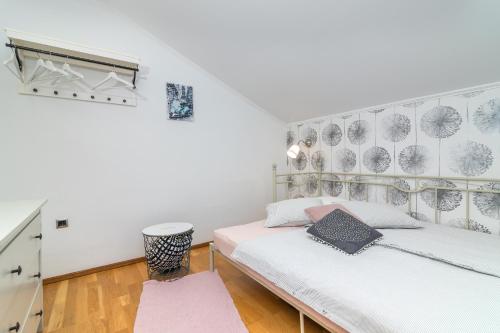 En eller flere senge i et værelse på House Rukavina Senj