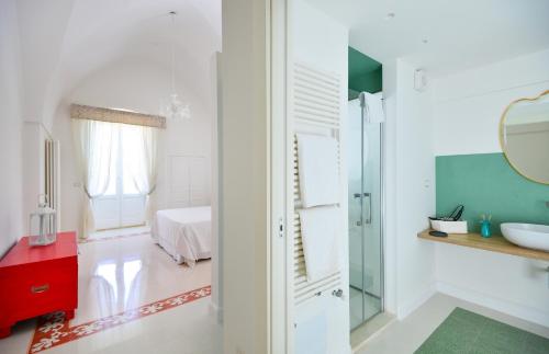 Ein Sitzbereich in der Unterkunft Palazzo Greco - Luxury Apartments with sea-view