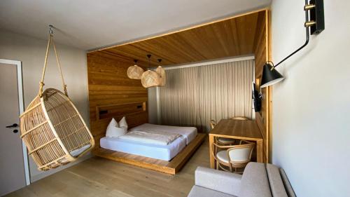 En eller flere senge i et værelse på Ferienwohungen Wedl