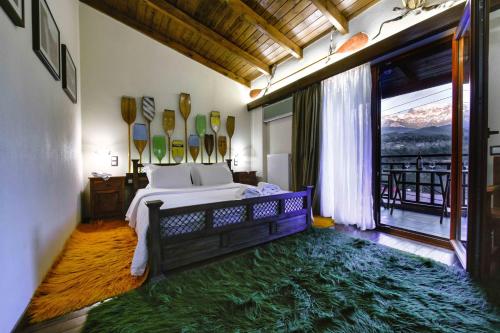 Кровать или кровати в номере Hotel Teloneio