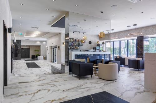 Jitomir Hotel — Lounge or bar