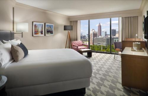 Ένα ή περισσότερα κρεβάτια σε δωμάτιο στο Omni Atlanta Hotel at Centennial Park