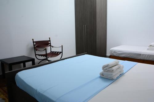 Een bed of bedden in een kamer bij Casa7 - Sakan 275
