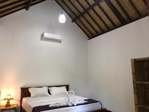 Giường trong phòng chung tại Cewin's Homestay