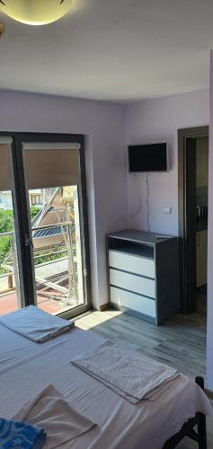Postel nebo postele na pokoji v ubytování Хотел Дани