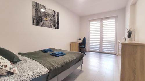 Posteľ alebo postele v izbe v ubytovaní Dąbska 18D by Homeprime