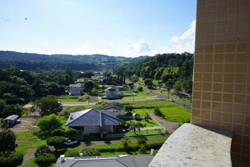 an aerial view of a house and a park at Hotel do Gringo in Erval Velho