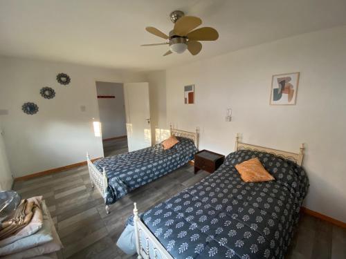 Postel nebo postele na pokoji v ubytování Casa Limon, en complejo residencial con Cochera