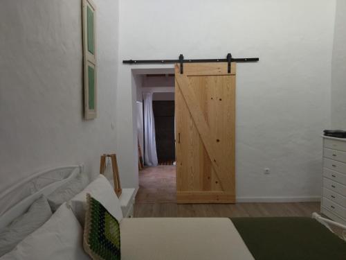 Postel nebo postele na pokoji v ubytování Monte da Rocha 3 Marias
