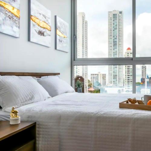 Llit o llits en una habitació de Espectacular Apartamento con Piscina en Panamá