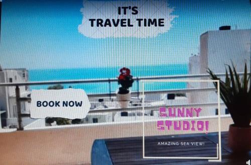 a person taking a picture on a cruise ship at Comfy Apartment near the Sea in Ierápetra