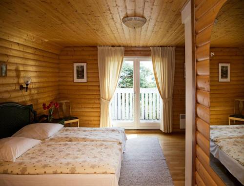 Postel nebo postele na pokoji v ubytování Kaluri Guesthouse