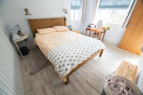 Ένα ή περισσότερα κρεβάτια σε δωμάτιο στο Tern Cottage
