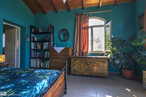 Posteľ alebo postele v izbe v ubytovaní Strongilos Homestay