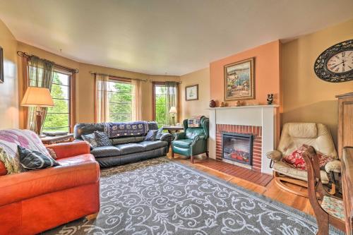 a living room filled with furniture and a fireplace at Sault Ste Marie Historic Home, Walk to Town! in Sault Ste. Marie