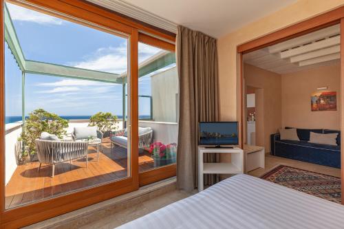 Ένα ή περισσότερα κρεβάτια σε δωμάτιο στο Residence La Gancia