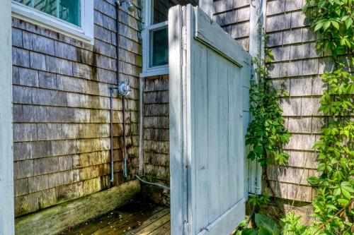 an open door on the side of a house at Beachroad Hideout in Lobsterville