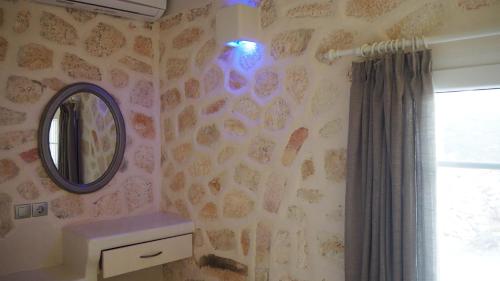 Ένα μπάνιο στο Ataraxia- Stonebuilt Studios and Apartments