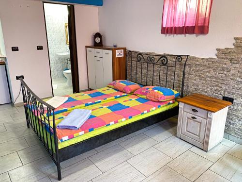 Postel nebo postele na pokoji v ubytování Synergy Deluxe Apartments
