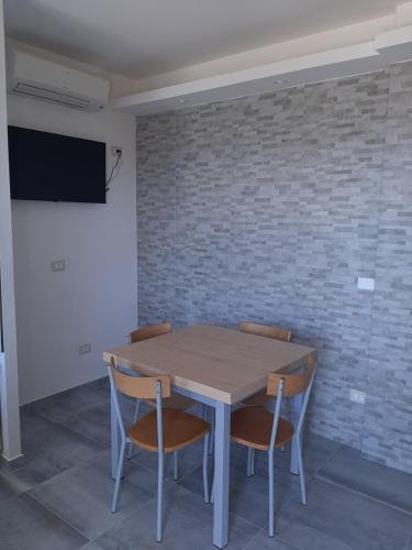 Televisyen dan/atau pusat hiburan di Terra di mare apartment & management