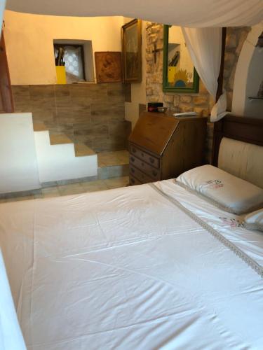 Postel nebo postele na pokoji v ubytování Camere buono