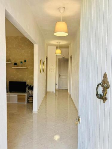 a hallway of a home with a hallway at Holiday House Ermionida in Thermisia