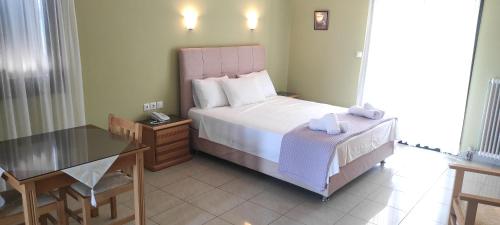 Hotel Patelisにあるベッド