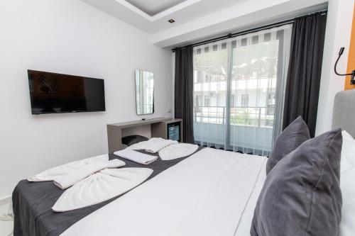 Leonis Hotelにあるベッド
