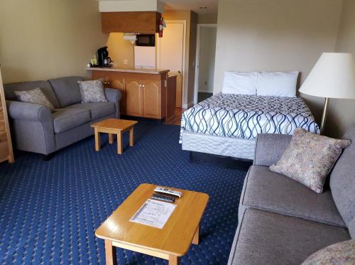Katil atau katil-katil dalam bilik di Windrifter Resort